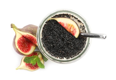 Photo of Delicious fig smoothie and ingredients on white background, top view