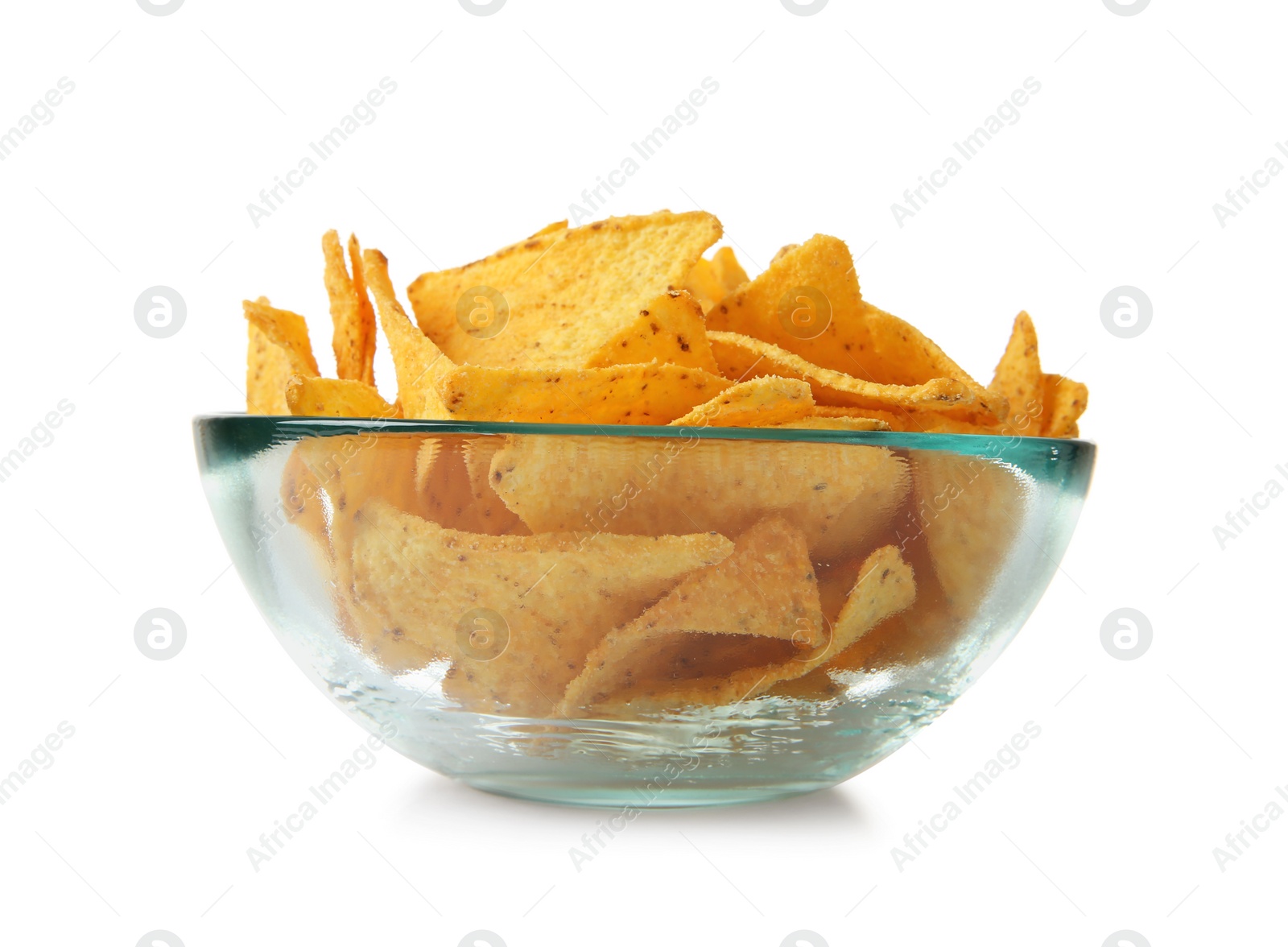 Photo of Glass bowl of Mexican nachos chips on white background