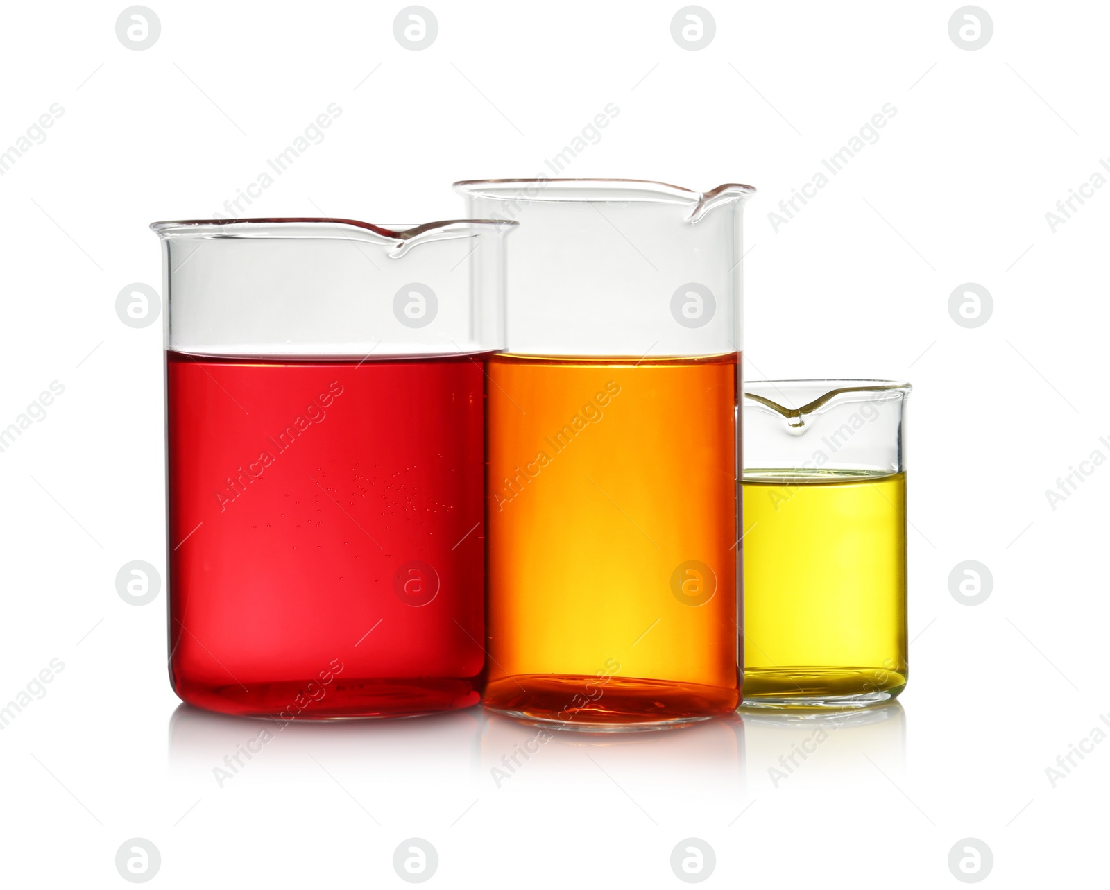 Photo of Beakers with color liquid isolated on white. Solution chemistry