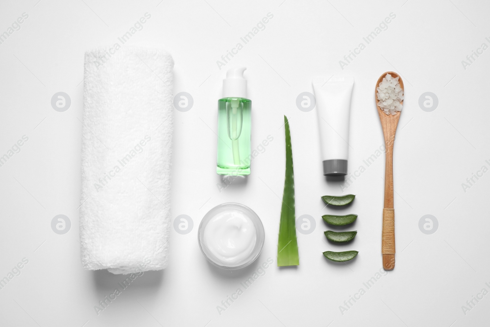 Photo of Flat lay composition with aloe vera and cosmetic products on white background