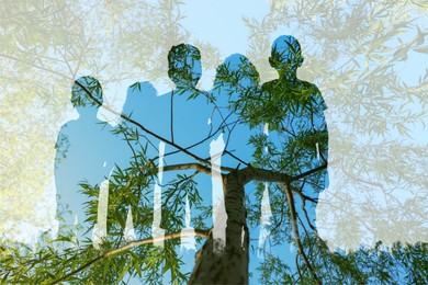 Silhouettes of children, tree and sky outdoors, double exposure