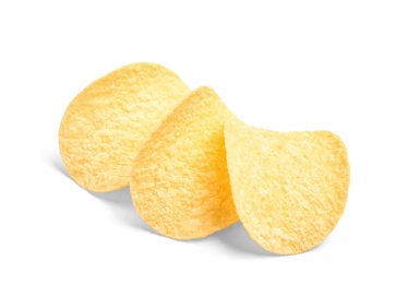 Tasty crispy potato chips on white background