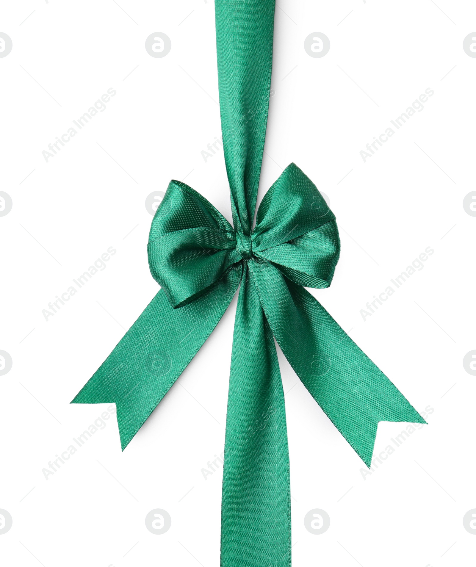 Photo of Green satin ribbon with bow isolated on white, top view