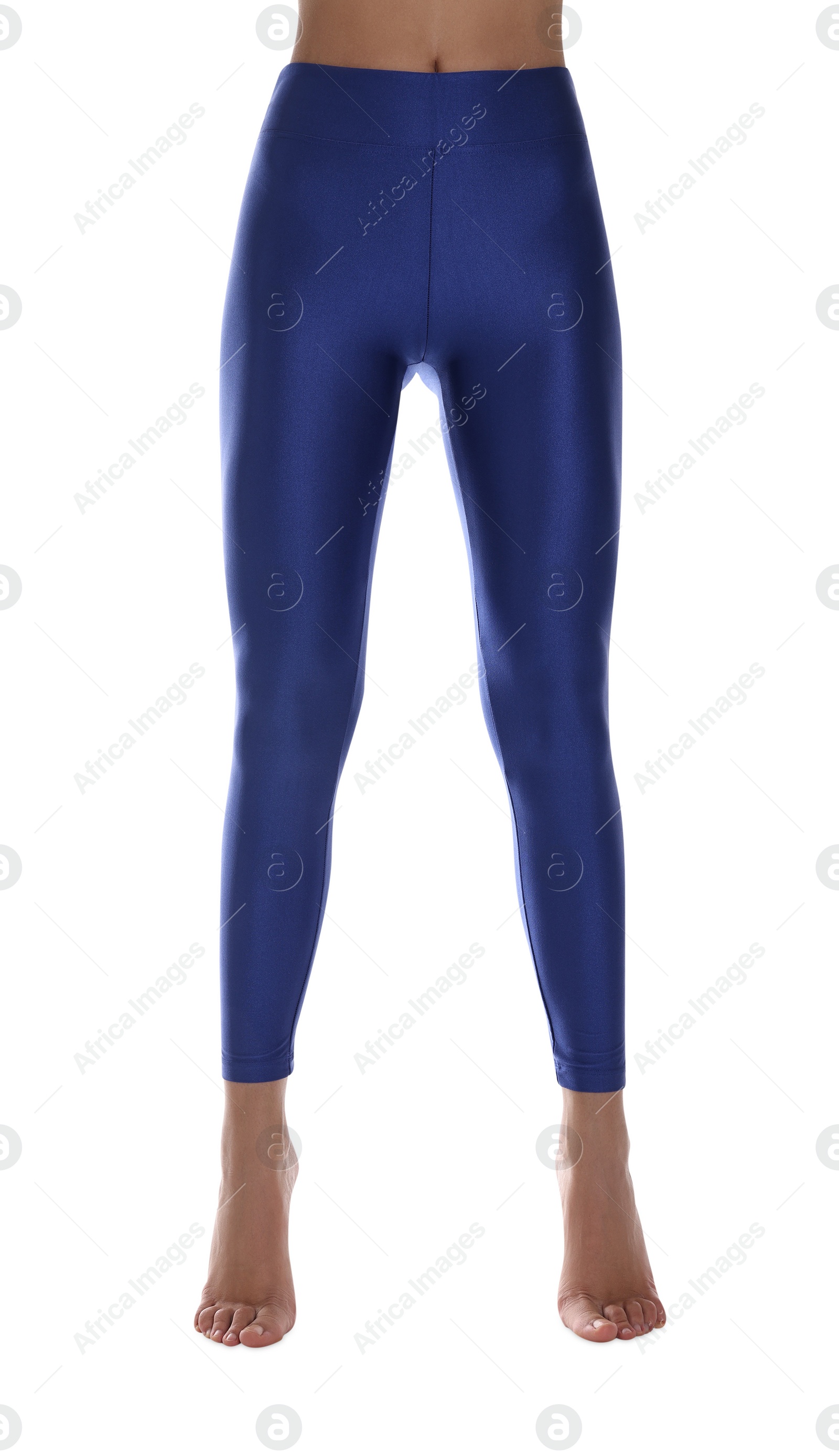 Photo of Woman with beautiful long legs wearing blue leggings on white background, closeup