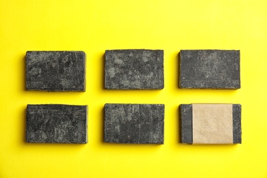 Hand made soap bars on color background, top view. Mockup for design