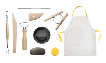 Image of Set of pottery tools, apron and ceramic bowl on white background