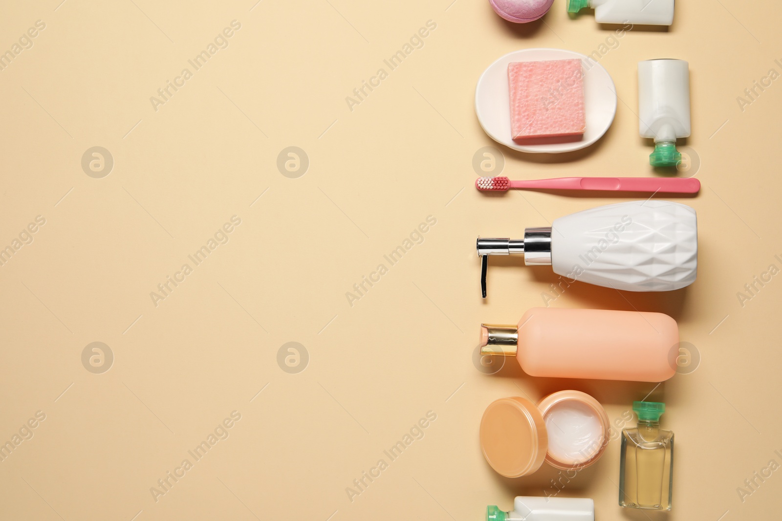 Photo of Bath accessories. Flat lay composition with personal care products on beige background, space for text