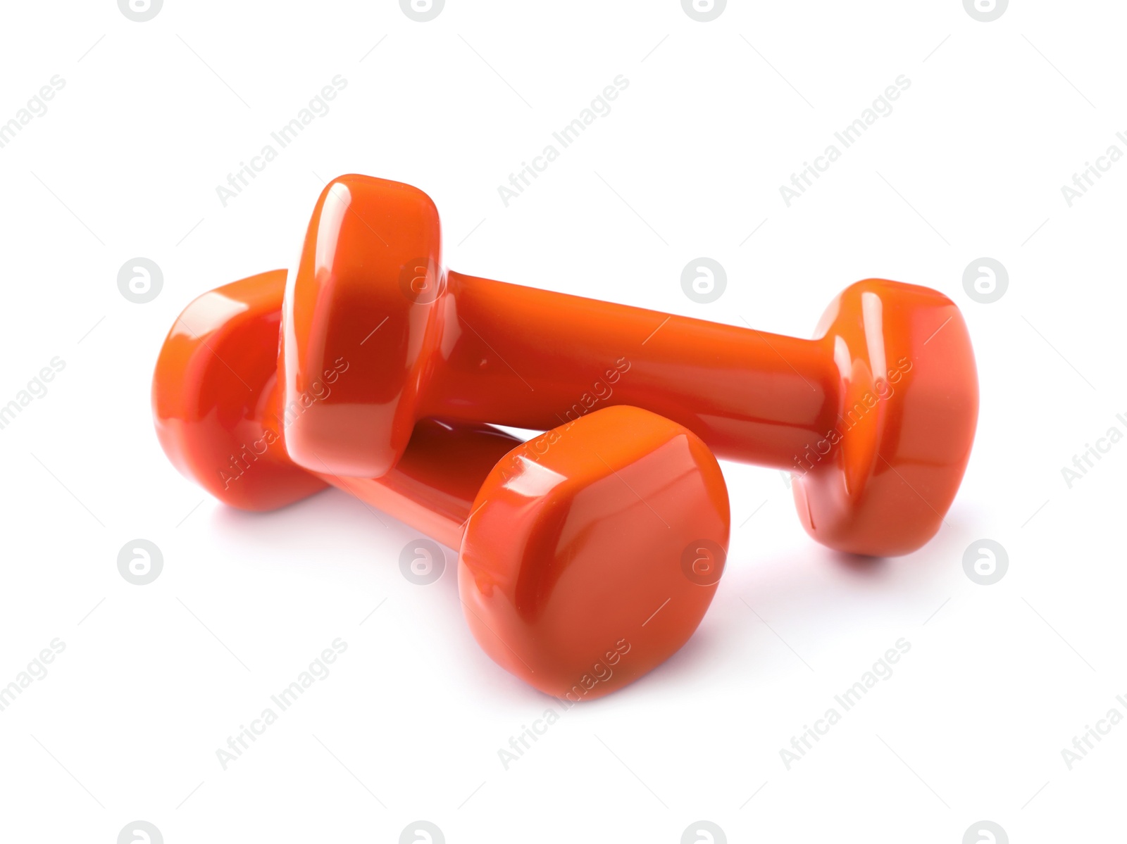 Photo of Color dumbbells on white background. Home fitness