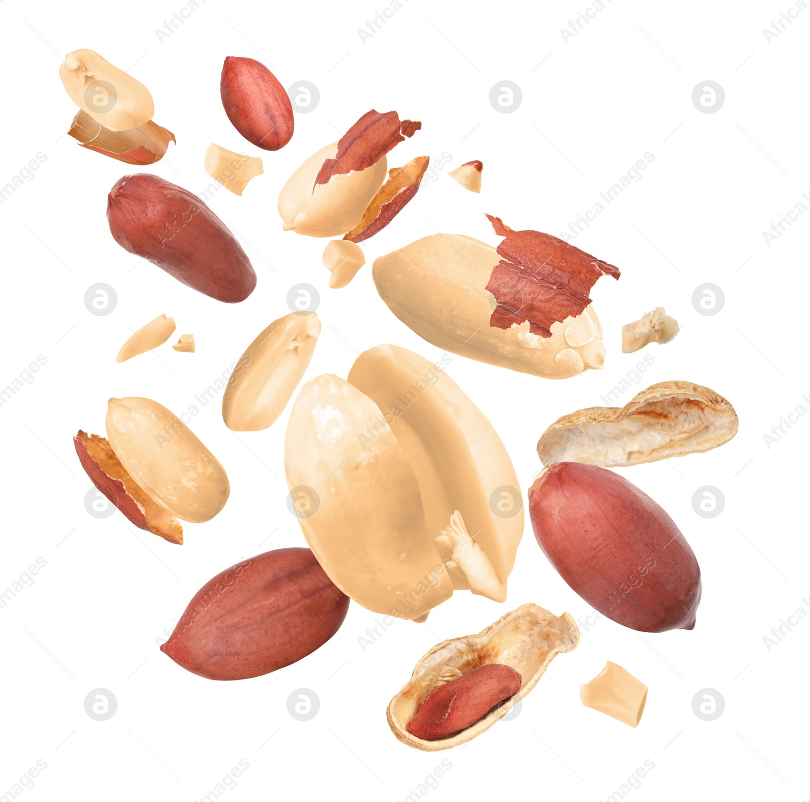 Image of Many peanuts in air on white background