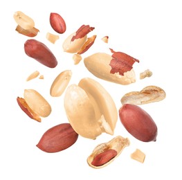 Image of Many peanuts in air on white background