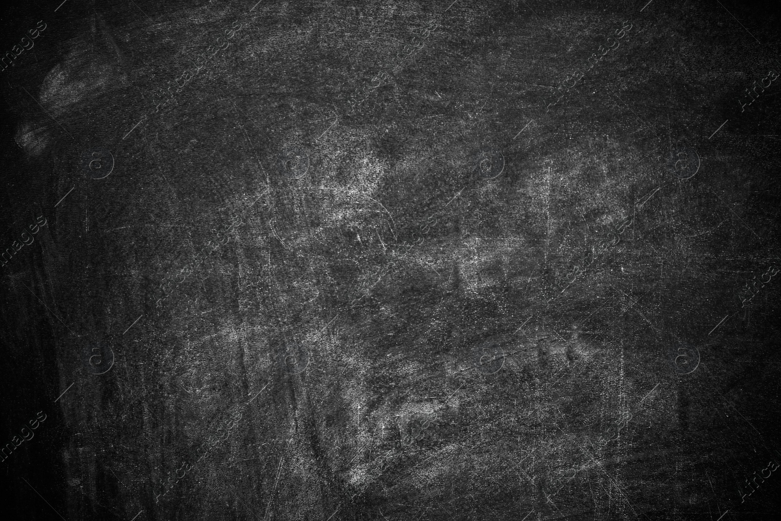 Photo of Dirty black chalkboard as background. Space for text