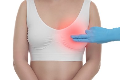 Woman suffering from pain visiting breast specialist on white background, closeup