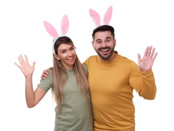 Photo of Easter celebration. Happy couple with bunny ears isolated on white