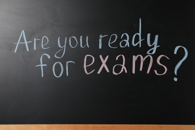 Blackboard with phrase Are You Ready For Exams as background