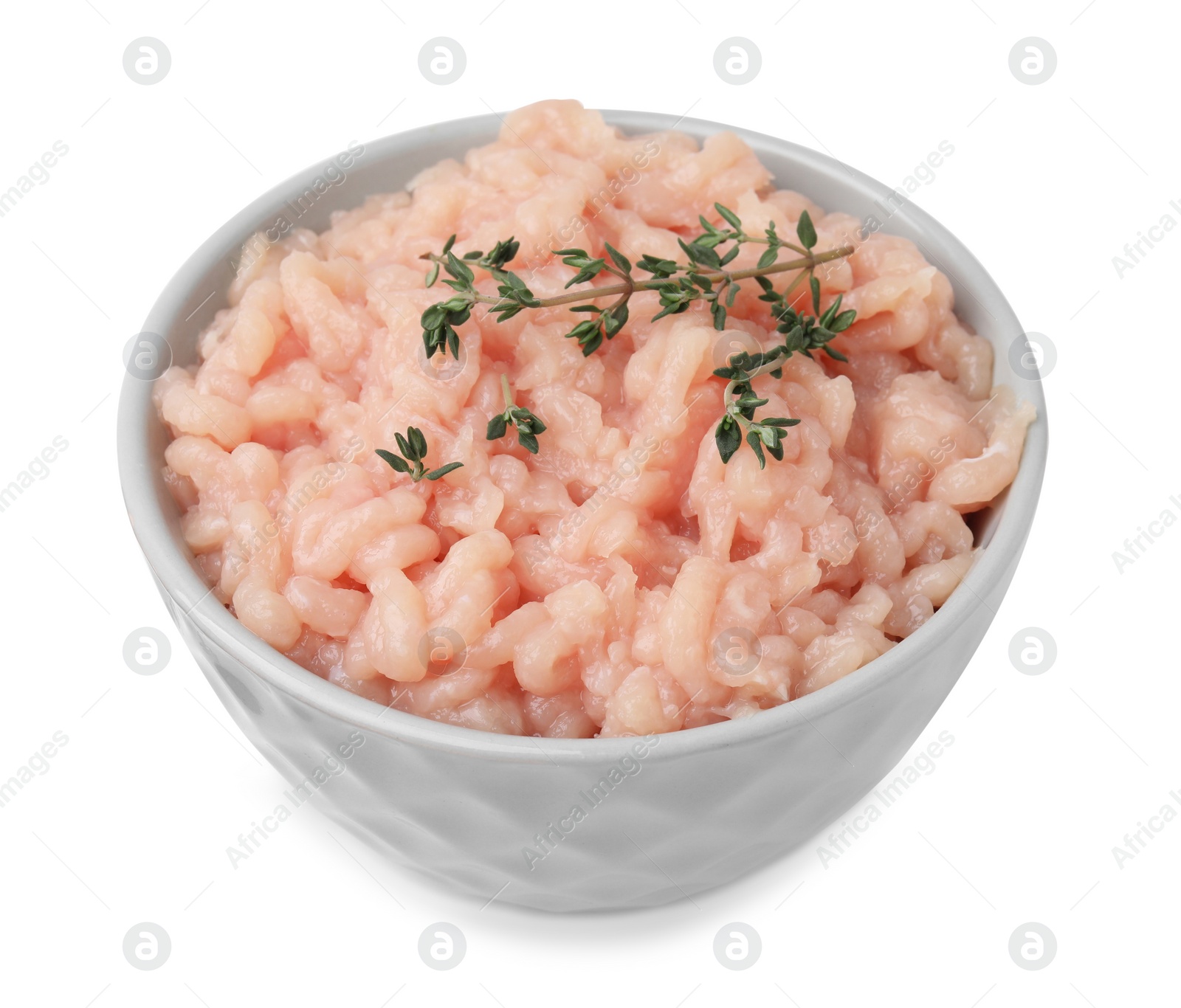 Photo of Fresh raw minced meat and thyme in bowl isolated on white