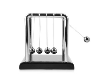 Photo of Newton's cradle isolated on white. Physics law of energy conservation