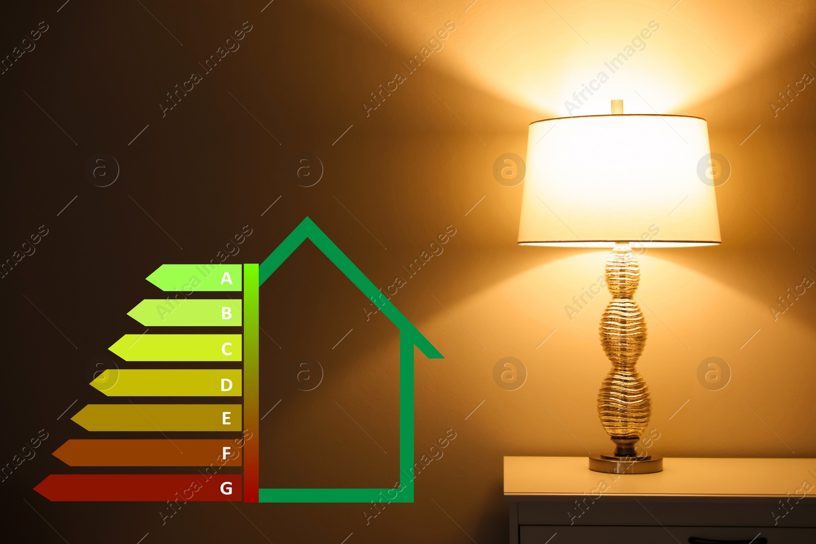 Image of Energy efficiency rating label and lamp on bedside table indoors