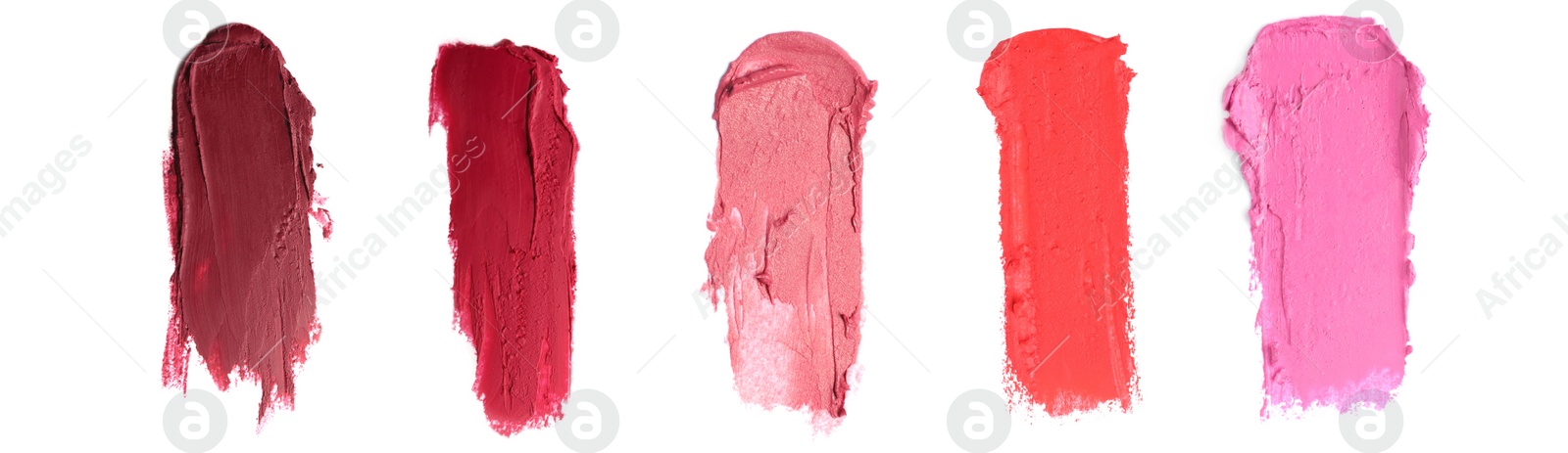 Image of Smears of different beautiful lipsticks on white background, top view. Banner design