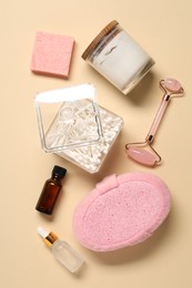 Photo of Bath accessories. Flat lay composition with personal care products on beige background