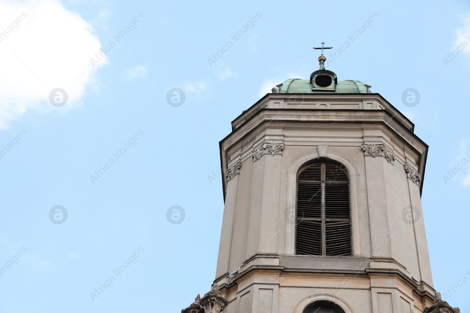 Photo of Exterior of beautiful cathedral against blue sky, low angle view