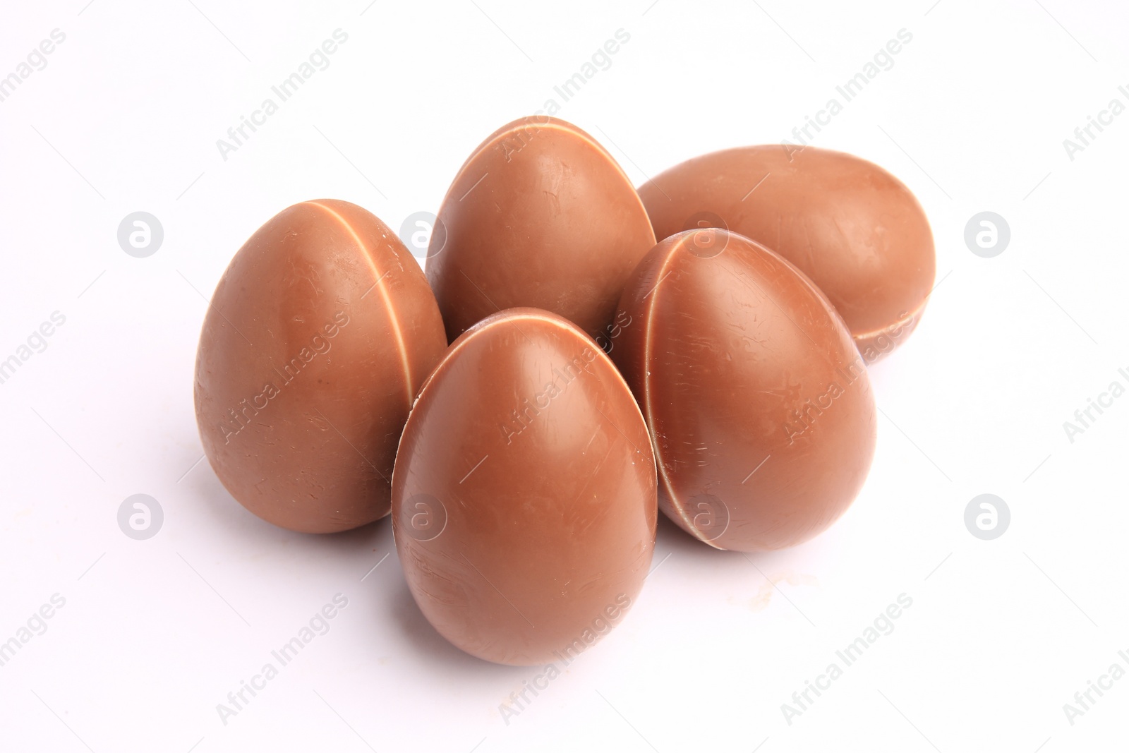 Photo of Sveti Vlas, Bulgaria - June 27, 2023: Unwrapped Kinder Surprise Eggs isolated on white