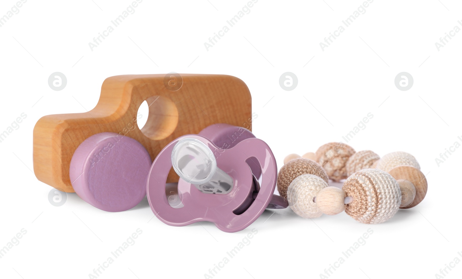Photo of Toys and baby pacifier isolated on white
