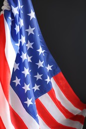 Photo of National flag of America on black background. Memorial day celebration