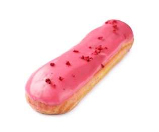 Photo of Delicious eclair covered with pink glaze isolated on white