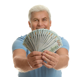 Photo of Happy senior man with cash money on white background, focus on hands