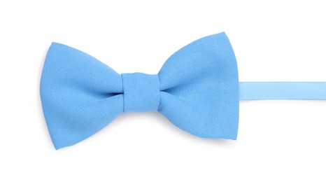 Stylish light blue bow tie on white background, top view