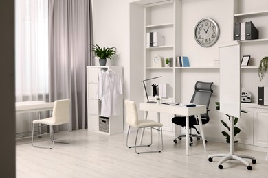 Modern medical office interior with doctor's workplace