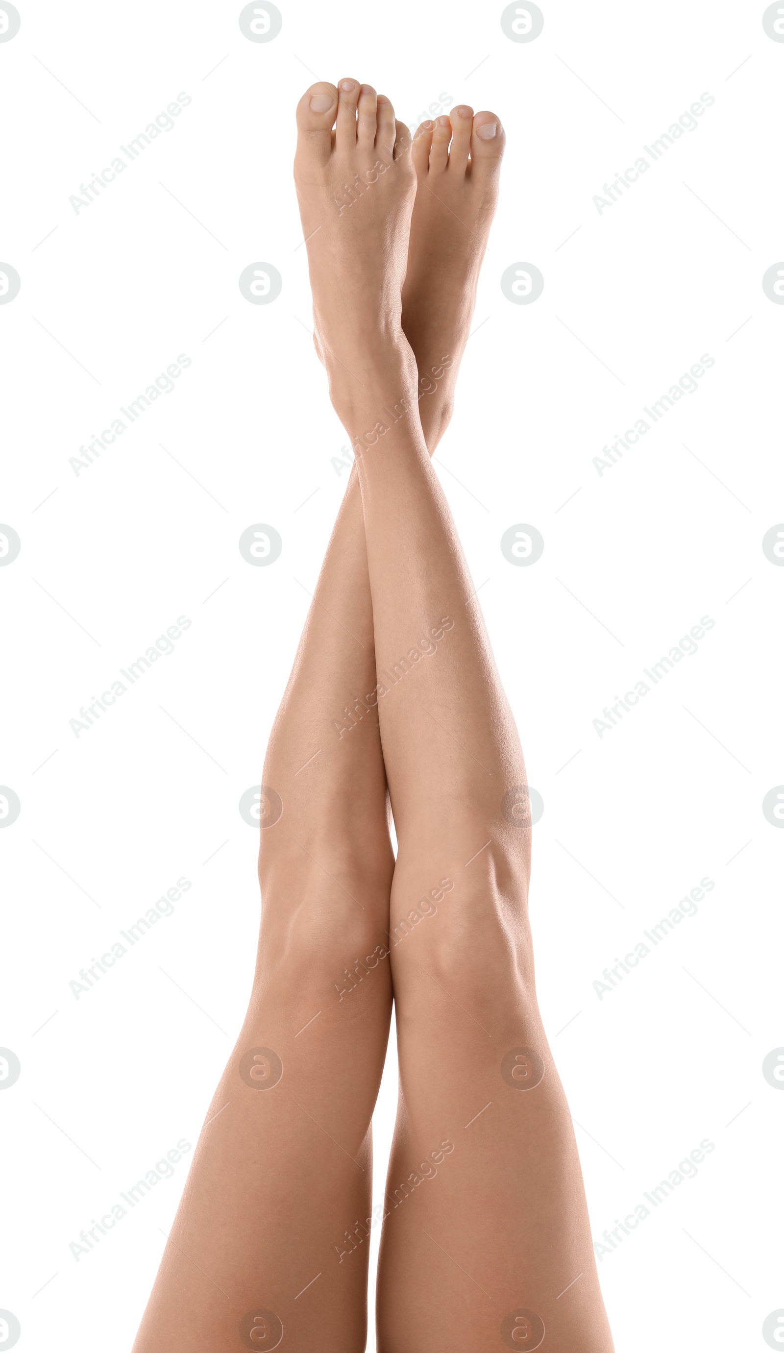 Photo of Young woman with beautiful long legs on white background, closeup