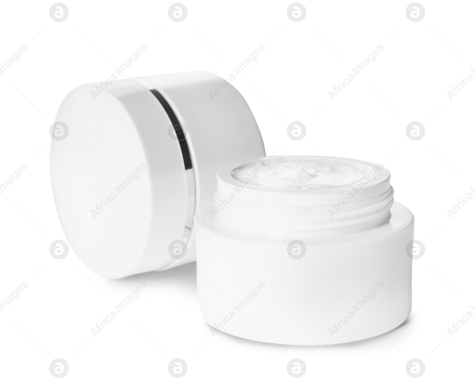 Photo of Jars of luxury face creams isolated on white