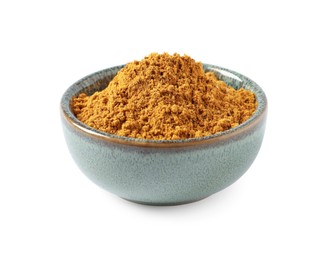 Dry curry powder in bowl isolated on white