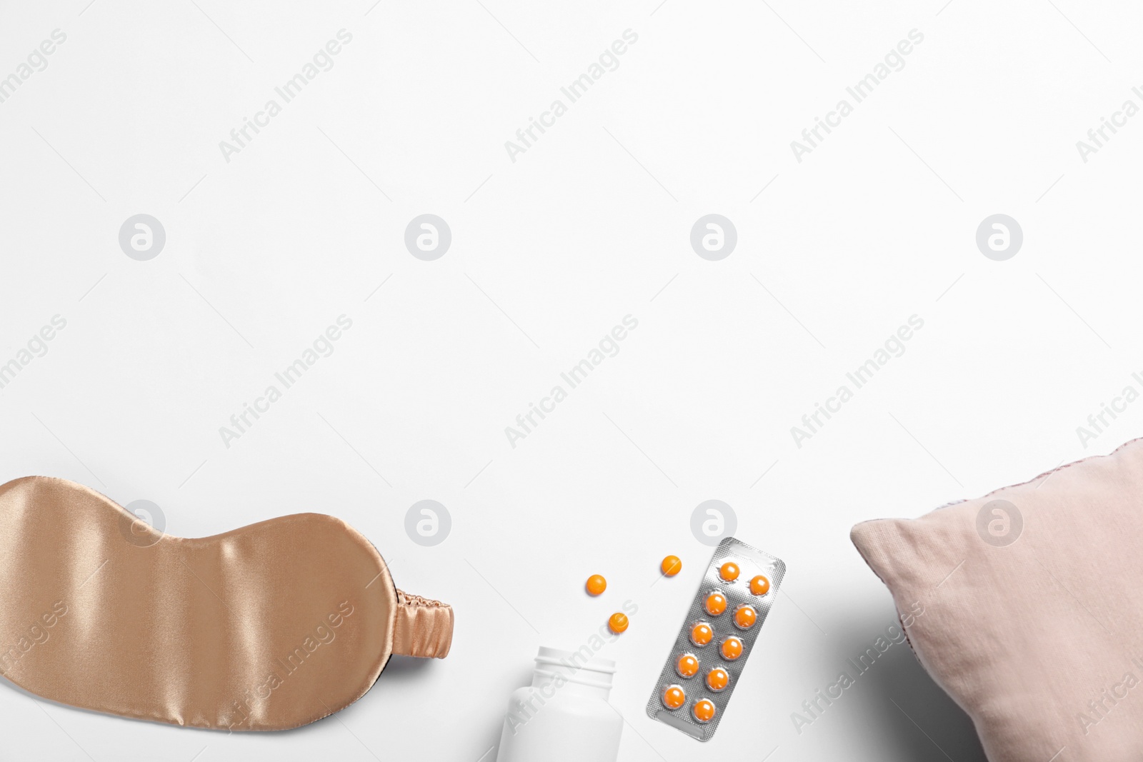 Photo of Composition with sleeping mask on white background, top view. Bedtime accessories