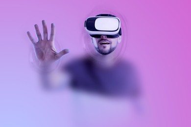 Image of Metaverse. Man walking through cyber fluid border during simulated experience using virtual reality headset. Illustration of immersion into digital space