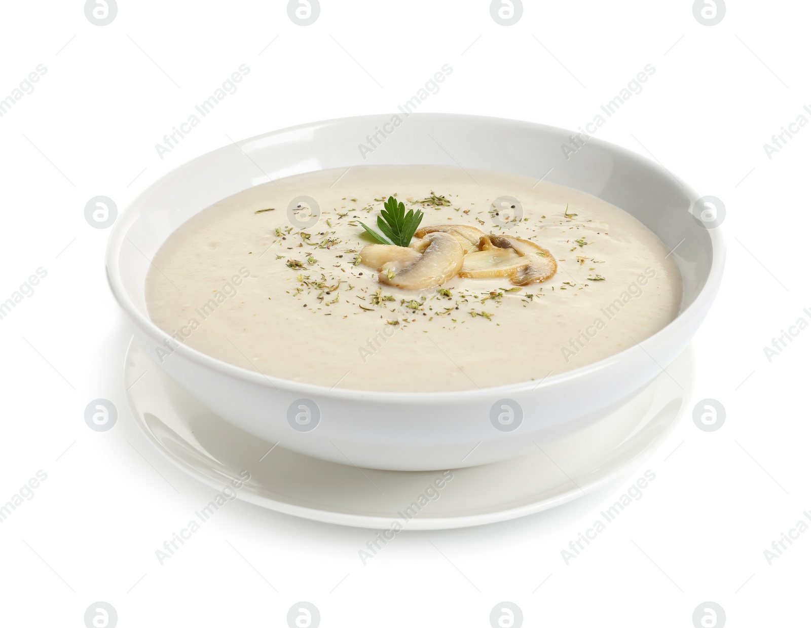 Photo of Dish with mushroom cream soup on white background. Healthy food