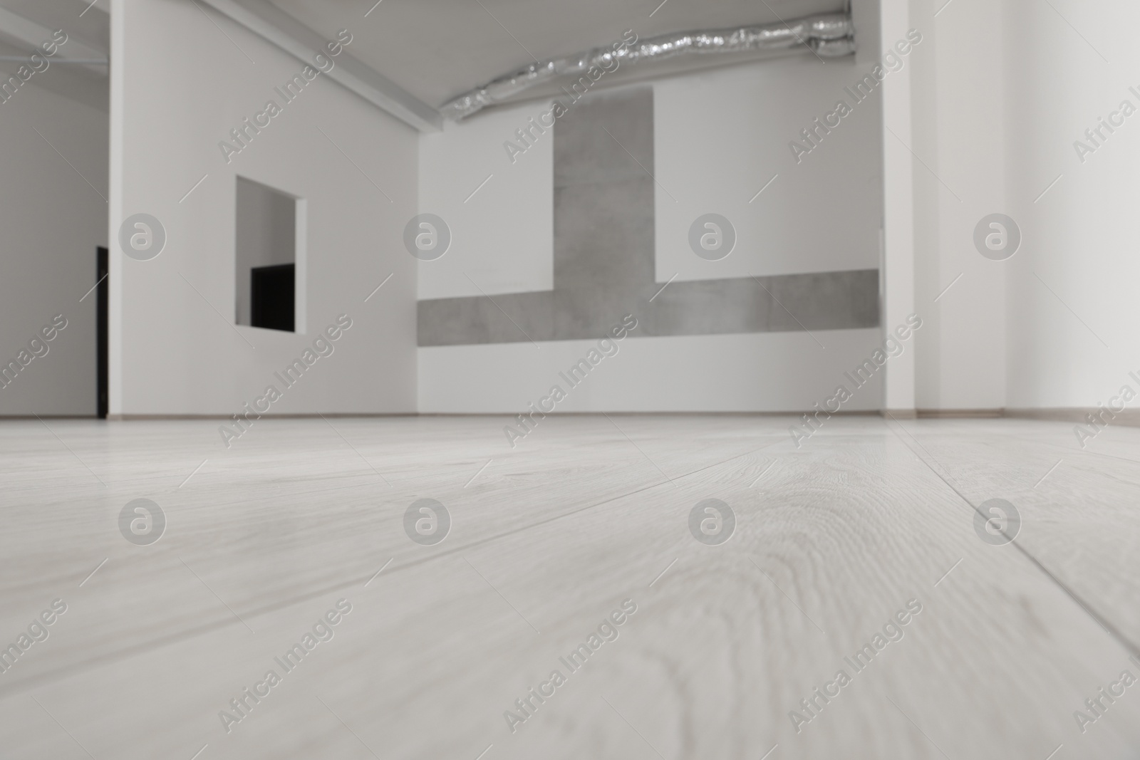 Photo of Empty office room with white walls and ventilation system. Interior design