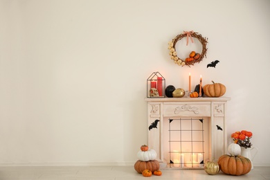 Photo of Modern room decorated for Halloween, space for text. Idea for festive interior