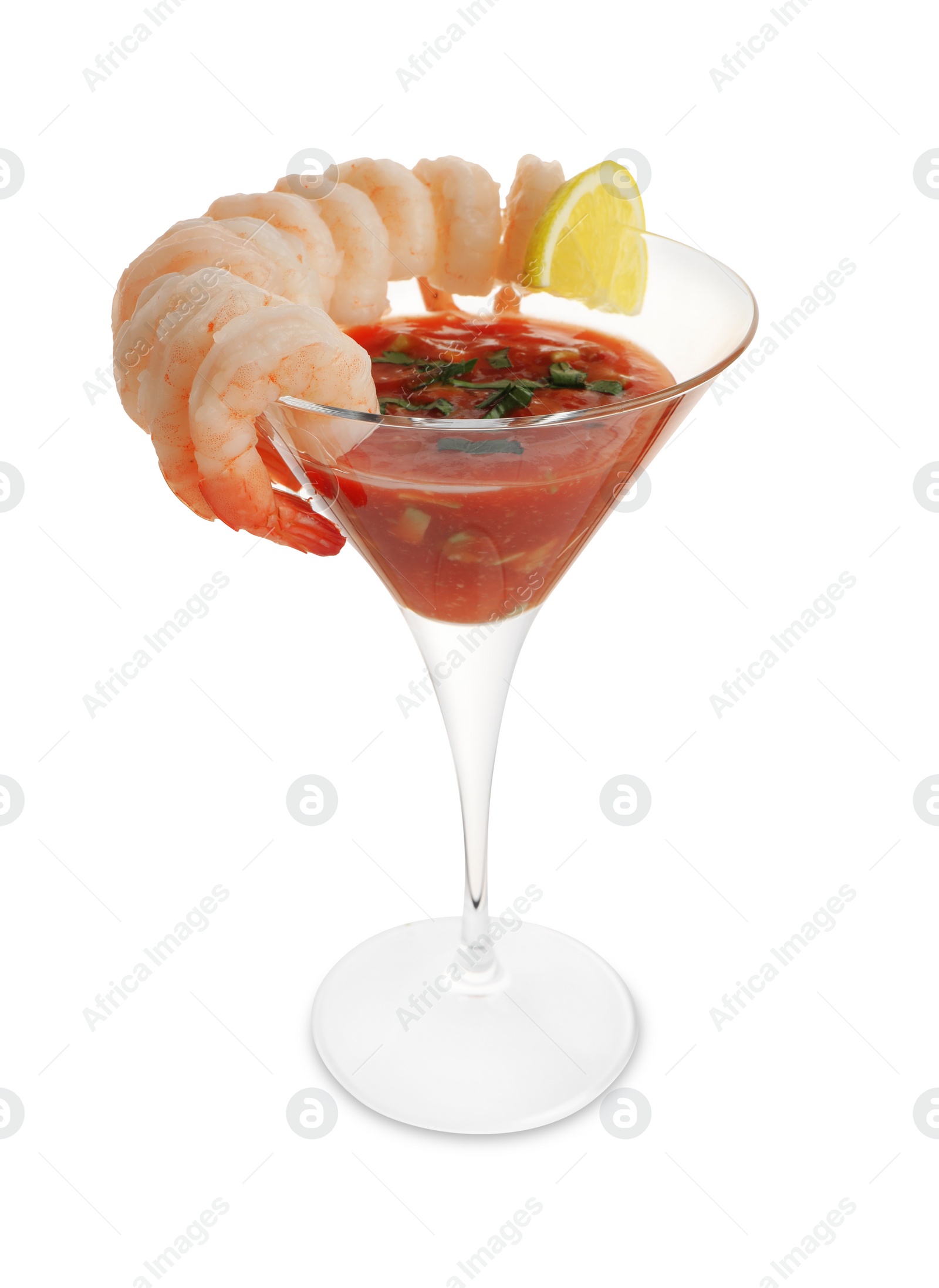 Photo of Tasty shrimp cocktail with sauce in glass and lemon isolated on white