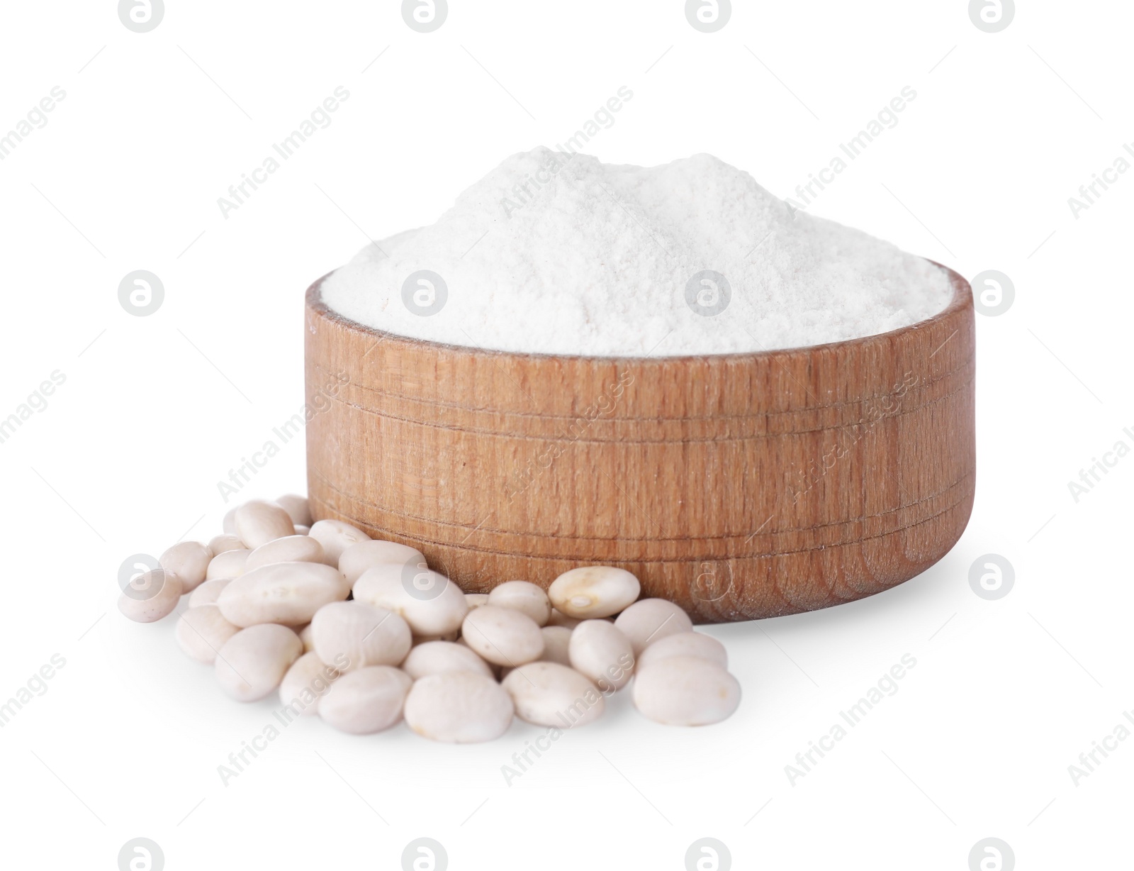 Photo of Wooden bowl with flour and kidney beans isolated on white