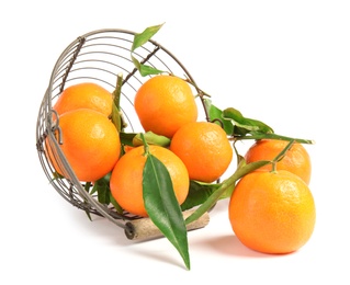 Metal basket with tasty ripe tangerines on white background