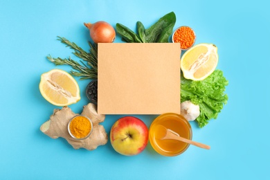 Photo of Natural products and blank card with space for text on color background, top view. Home remedies for asthma