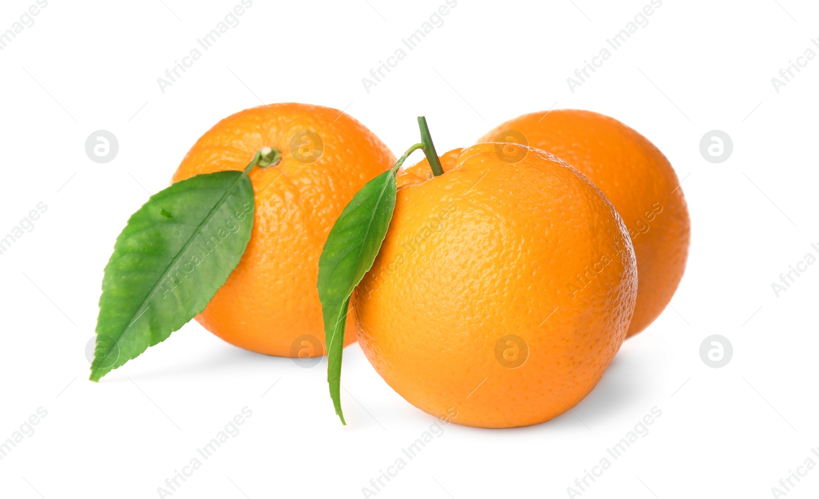 Photo of Fresh ripe oranges with green leaves on white background