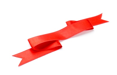 Simple red ribbon on white background. Festive decoration