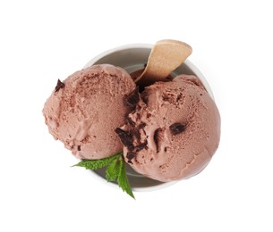 Photo of Paper cup with tasty chocolate ice cream, sticks and mint leaves isolated on white, top view