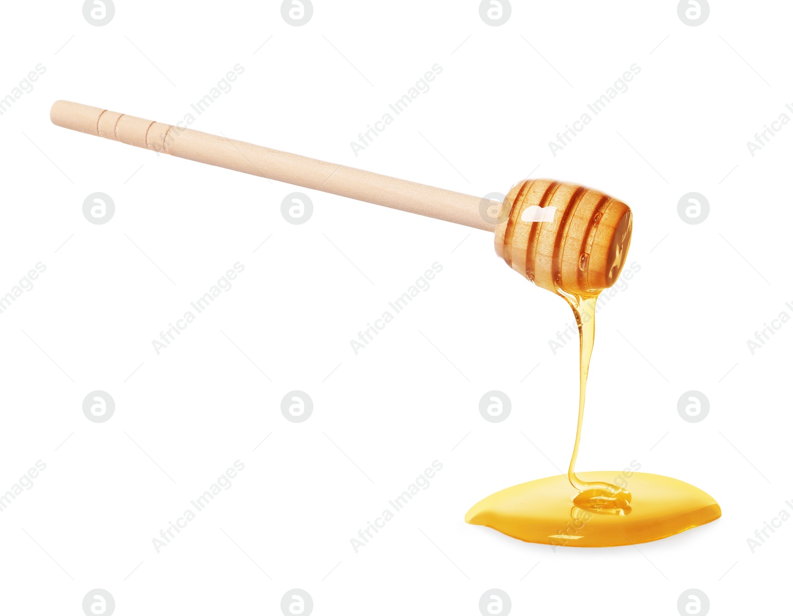 Photo of Natural honey dripping from dipper on white background