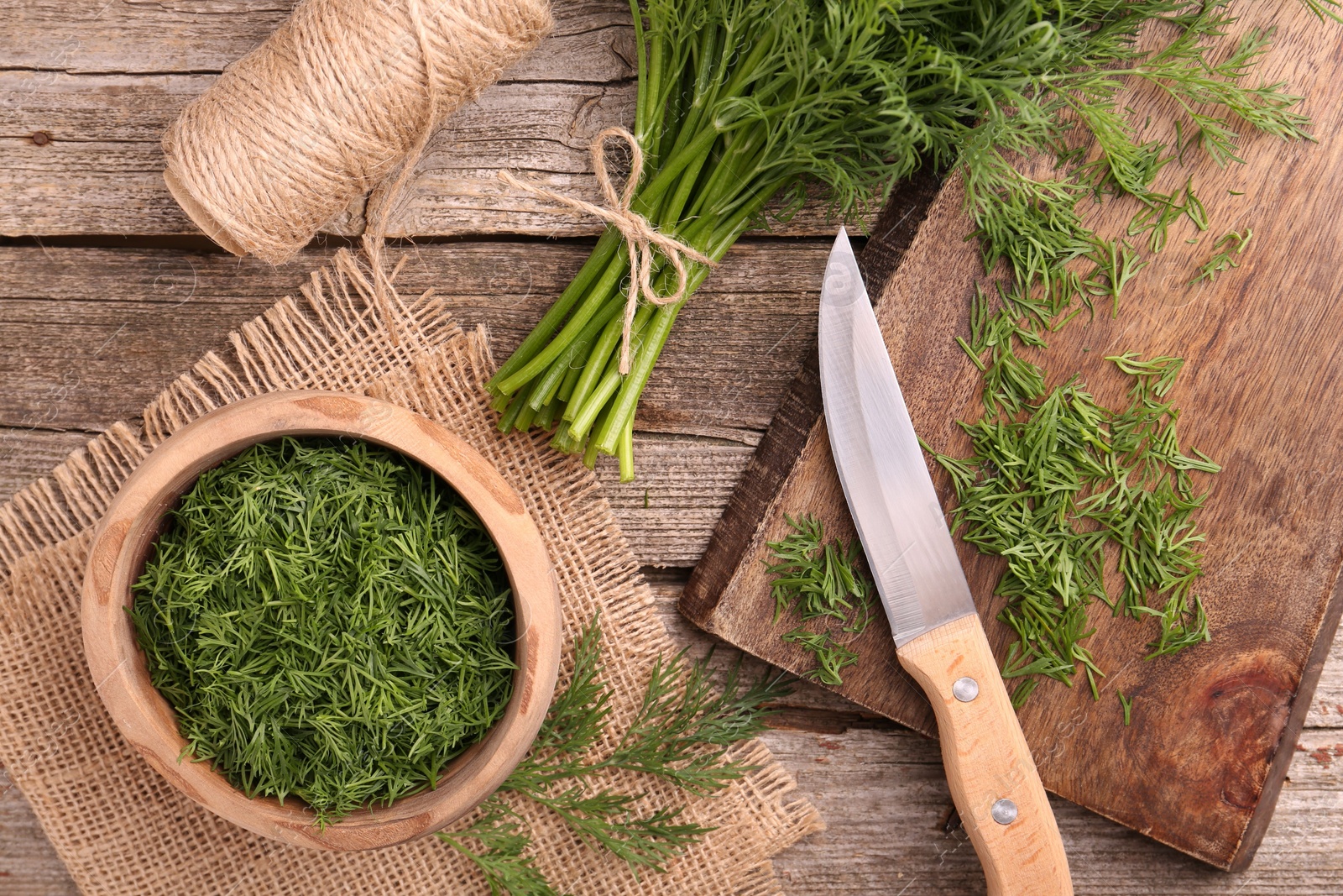 Photo of Flat lay composition with fresh dill on wooden table