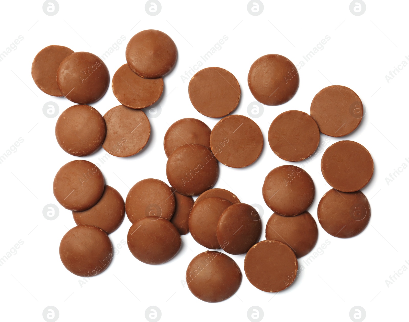 Photo of Delicious milk chocolate chips on white background, top view