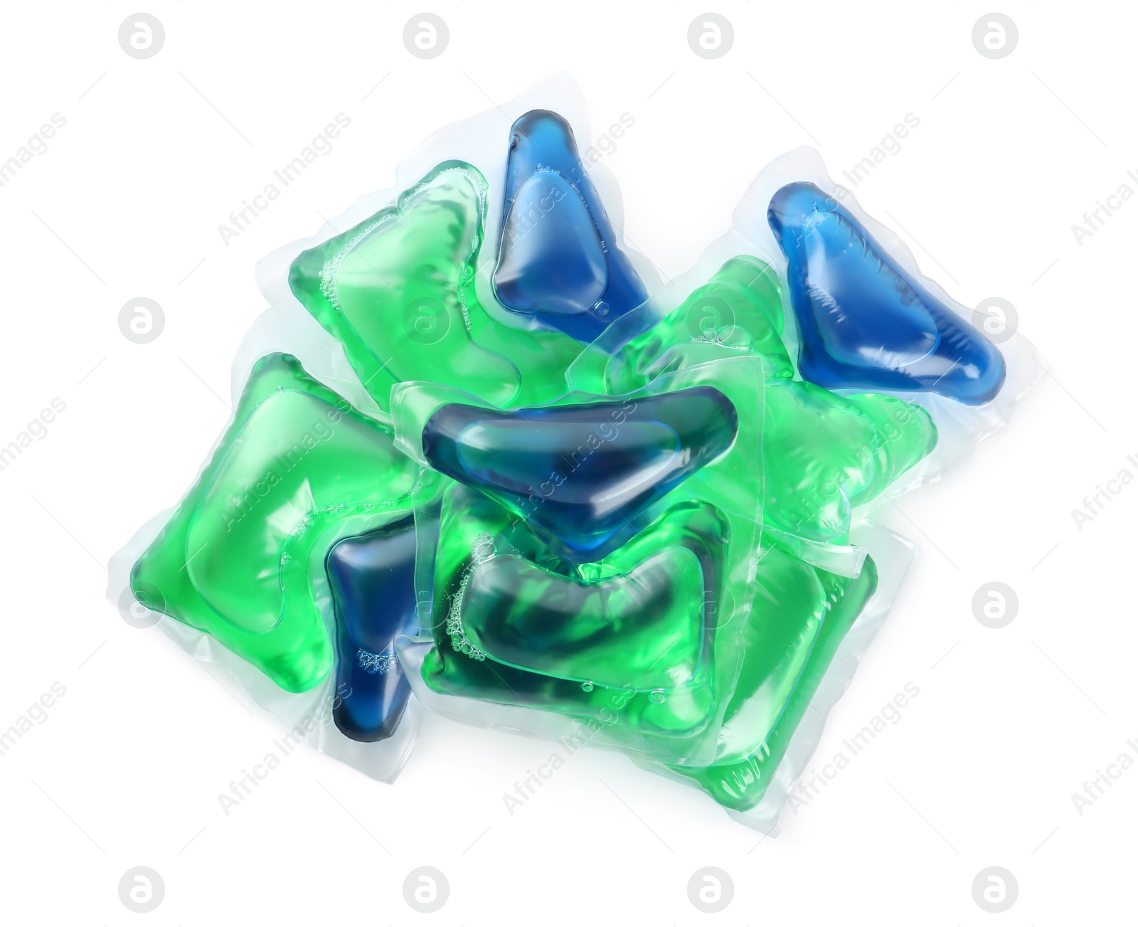 Photo of Heap of laundry capsules on white background, top view